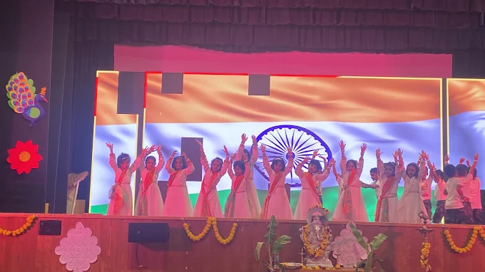 Children performing Republic Day dance on stage