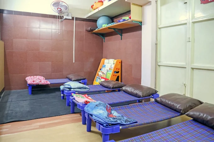 Nap room with cots and cushions