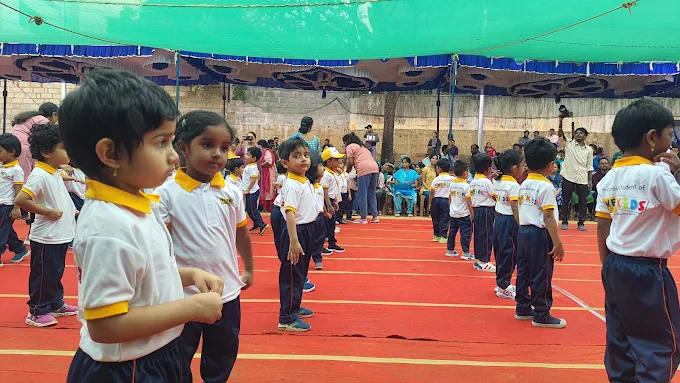 Students in outdoor Sports Day formation