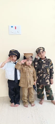 Boys dressed as pilot and army officer