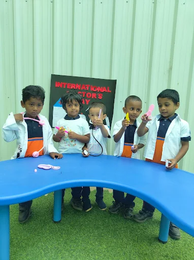 Kids dressed as doctors for Doctor's Day
