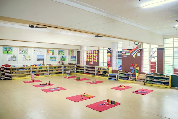 Classroom set up with activity mats and shelves