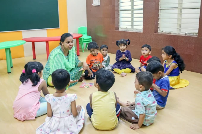 Teacher reading a storybook to children