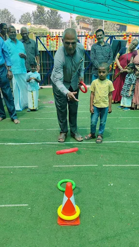 Annual Day ring-toss game with festive decorations